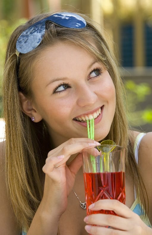 woman with drink and straw