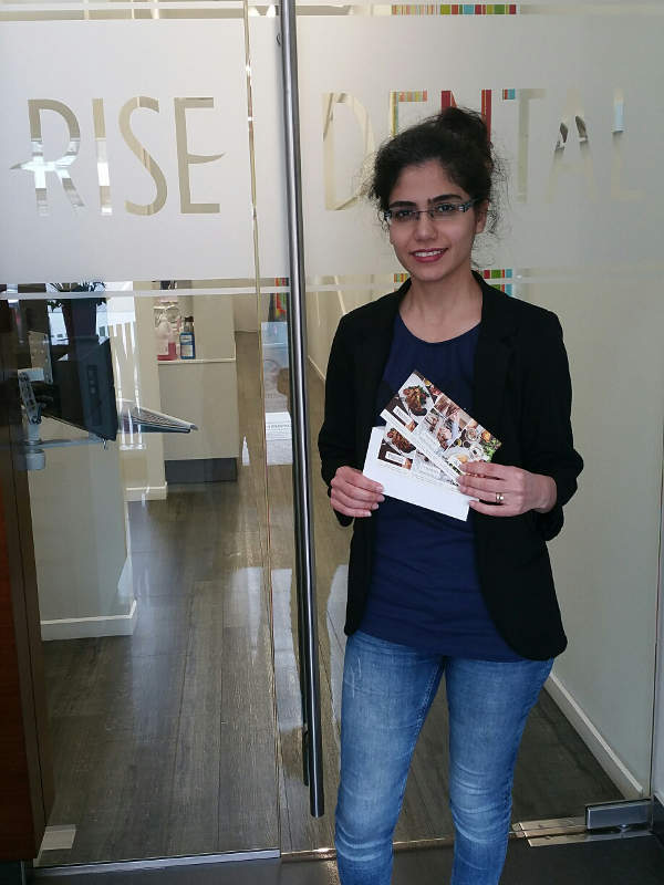 referral reward winner Rayeheh with gift cards